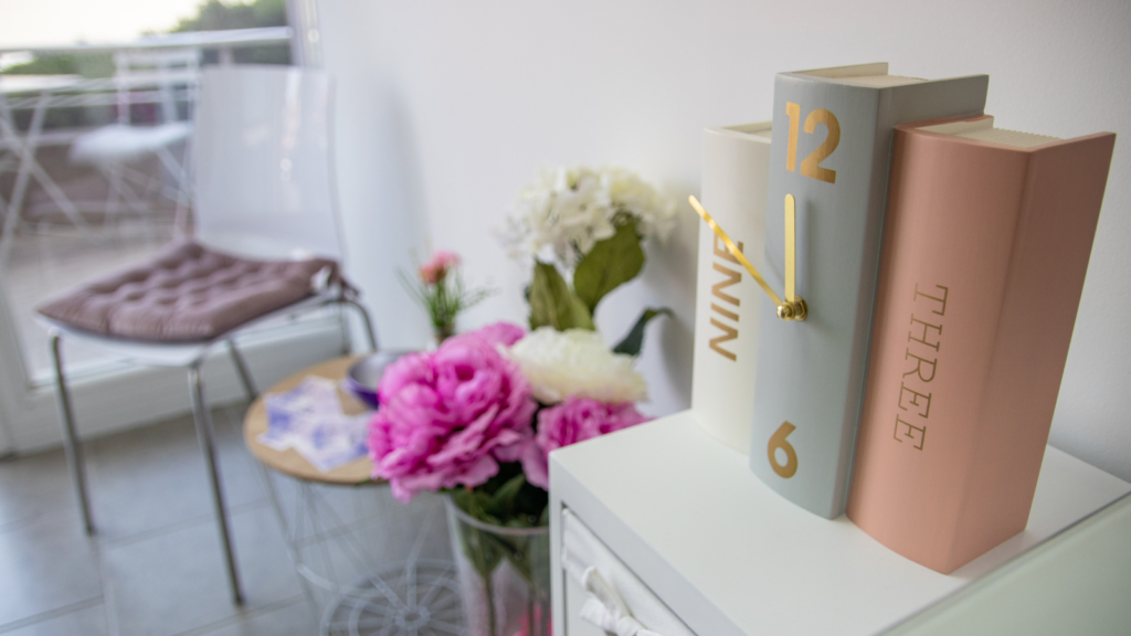 Indoor chair, table, flowers and clock